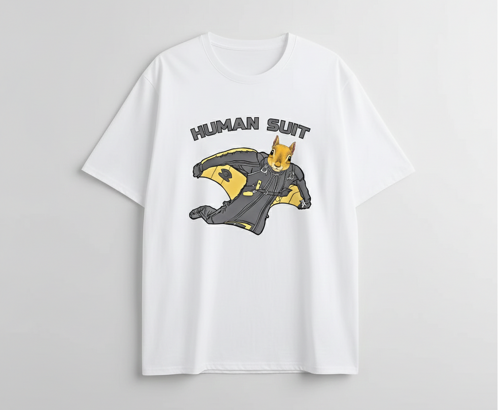 White t-shirt with a graphic of a superhero in a 'Human Suit' on a gray background